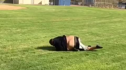 Big guy black shirt flips in park