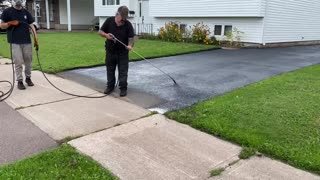 Professional Asphalt Spray Sealing: “The Gusty One” Top Coats Pavement Maintenance