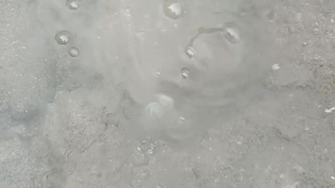 boiling water coming out from underground