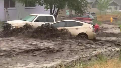 Intense Flooding Carries Cars Away