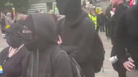 Masked ANTIFA thugs and patriots face off in Portsmouth today at the Enough