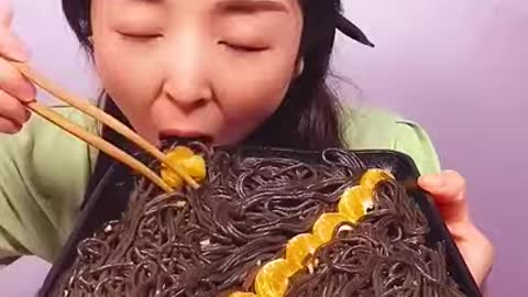 EATING BLACK NOODLES IN FASTEST WAY..