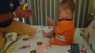 Dad Teaches Toddler Son To Disinfect His Hands