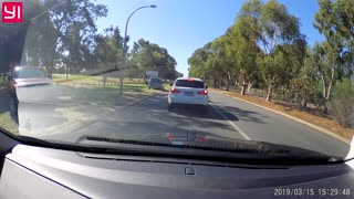 SUV Nearly Sideswipes Motorcyclist