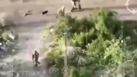 Stray Dog Chases Fleeing Russians on Scooters