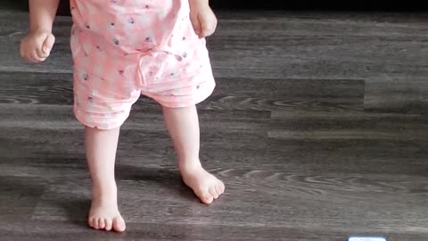 Little girl dancing to The Electric Slide