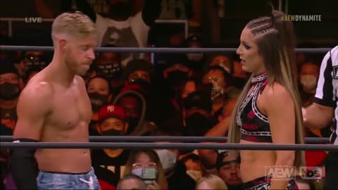 Orange Cassidy tries with Britt Baker