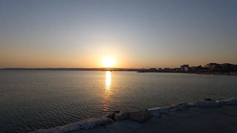 Beautiful sunset view at the sea with music