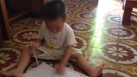 Baby is painting very nice as artisr