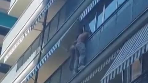 A worker in southern Spain came to the rescue after a young boy climbed onto