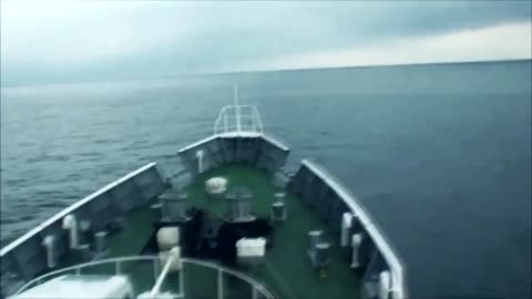 Japan 2011 - Coast Guard ship rides over tsunami wave