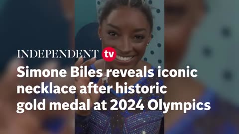 Simone Biles celebrates her gold medal with a diamond goat necklace