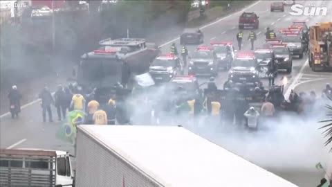 Brazilian police fire water cannons and rubber bullets at anti Lula protesters