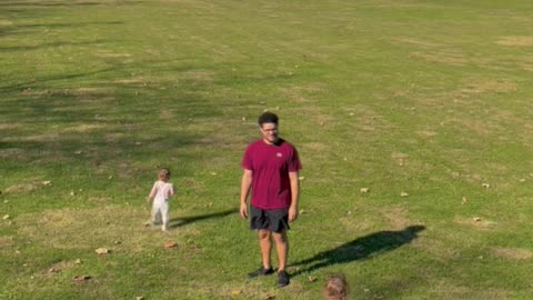 Twins Walking Down a Hill Fall Simultaneously