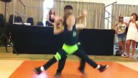 little boy and girl dance