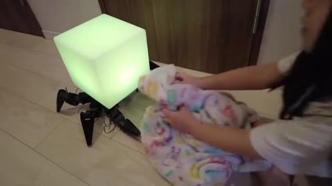 A walking bedside lamp designed by a Japanese...