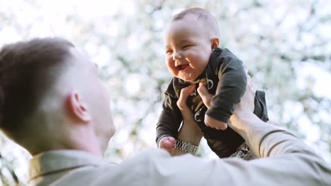 father and child having happy moments