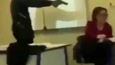 Migrant that attends a school in France pulls a pistol out on a teacher.