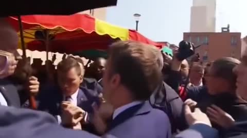 Newly re-elected French President Emmanuel Macron gets pelted with a tomato