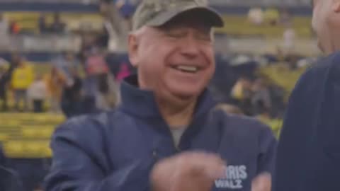 Tim Walz attends a football game, unrecognized, no cheers, roots against Minnesota—as Governor!