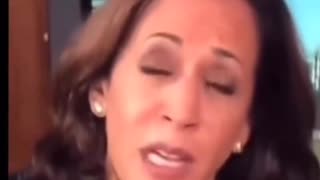 Is it Obama in Kamala's ear?