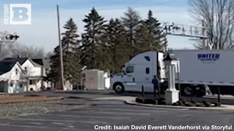 Close Call! Man Jumps Out of Truck Seconds Before Train Demolishes It