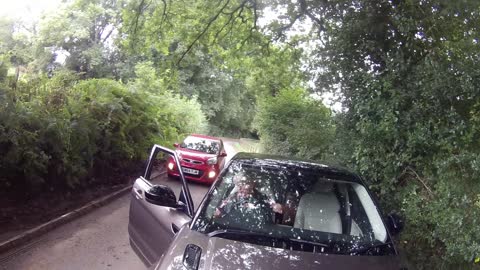 Confrontation Between Cyclists and Driver