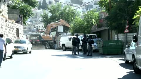 Israeli forces demolish Palestinian shop