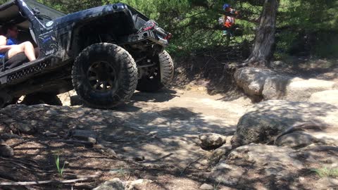 TJ Jeep giving the bump up a ledge Tuttle ORV