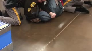 Police Officer Unloads Taser After Tussle