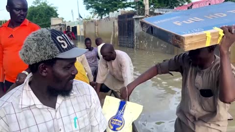 Floods force Nigerians to turn to boats, at a steep price