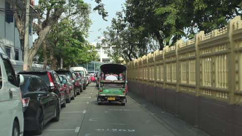 Traffic by tuktuk and vehicles