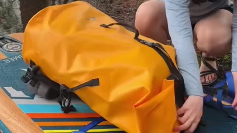 How to pack for paddle board camping - dry bags, NRS strap & what to bring