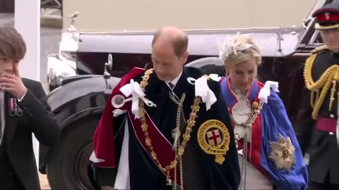 Prince Harry arrives at King Charles's Coronation in Westminster Abbey - BBC News