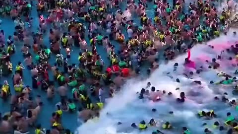 Is this the world's largest pool rave? 🚀💦