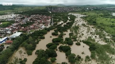 Dams burst in Brazil as deadly flooding continues - BBC News