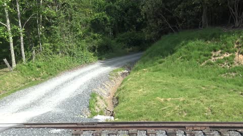 Thomas The Tank Engine At A Railroad Crossing