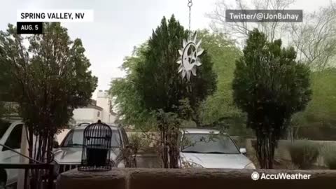 Floodwater rushes through the Mojave Desert