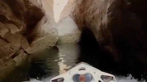 How did she go to play in the flowing water in the middle of the mountain?