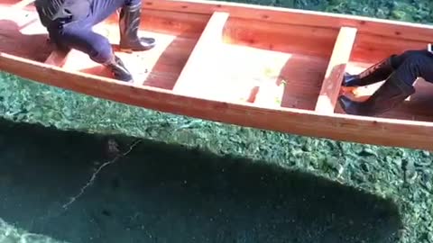 Two man on the boat enjoying the nature