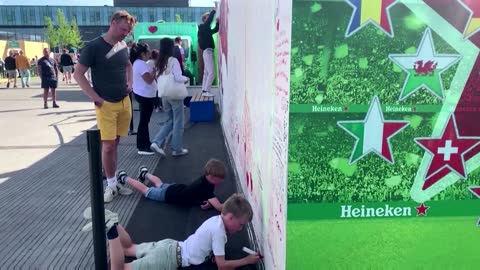 Soccer fans write messages to Christian Eriksen