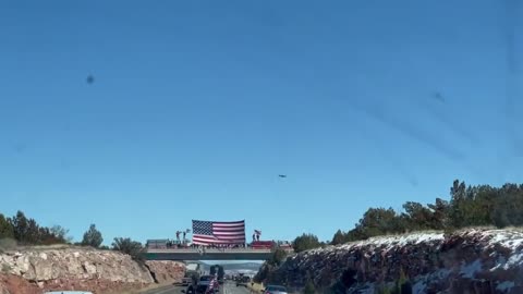 Seligman, AZ Fire Department Greets the Freedom Convoy with a MASSIVE American Flag