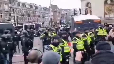 Dutch army veterans have stood as human shields peaceful protesters during the ongoing protests