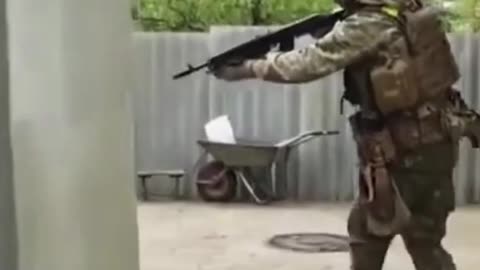 Troops Clearing A Neighborhood In The Ukraine-Russia War