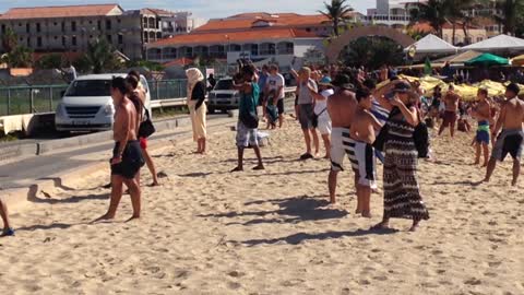 Beach Goers Get Blown Off The Beach By Airplane