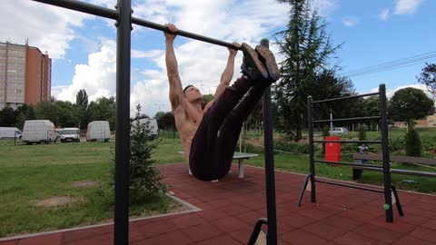 Shredded guy workout his six pack outdoor