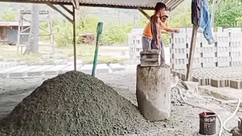 Andris is checking the quality of blocks