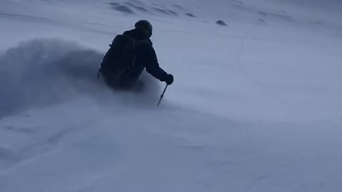 Skier Carves Fresh Powder in Beautiful Switzerland