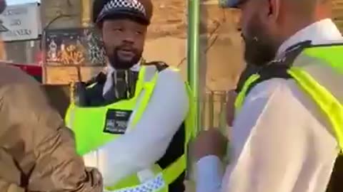 This police officer arrested me for holding and eating Banana!