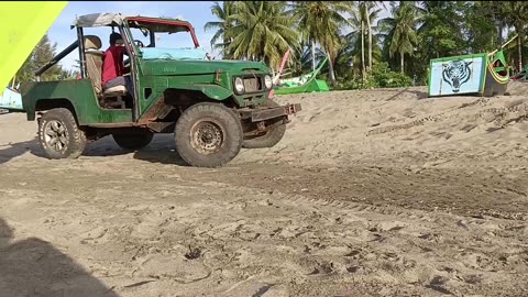 The Process of Withdrawing a Boat to the Mainland Using a Car